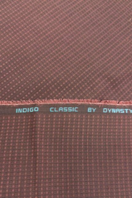 Close-up of Dynasty Indigo Classic textured maroon shoe fabric with branding detail.