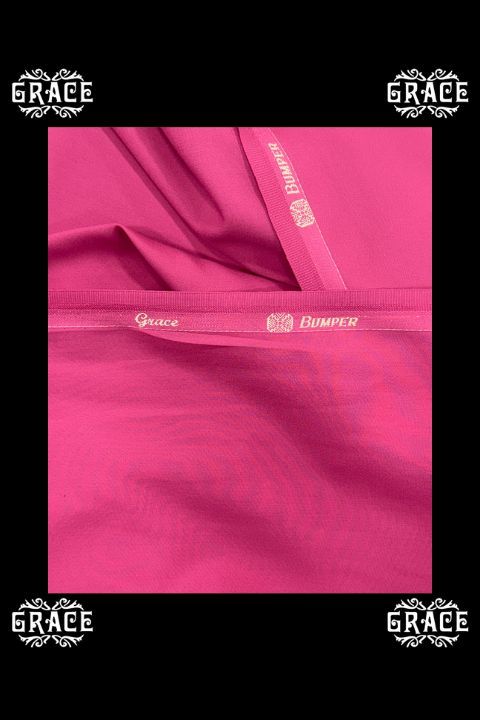 Neon pink fabric bumper with Grace branding for Grace Fabrics collection.